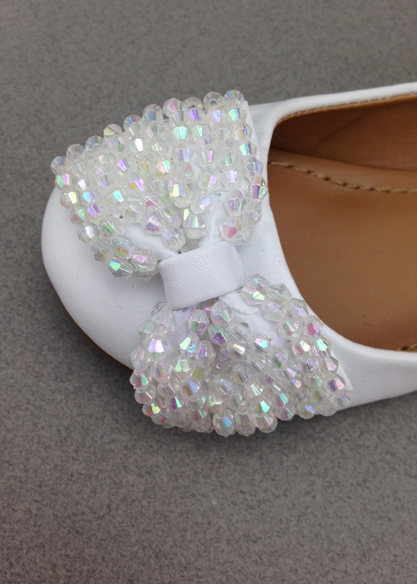 white beaded flats