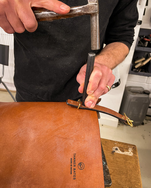 leather craftsman at work