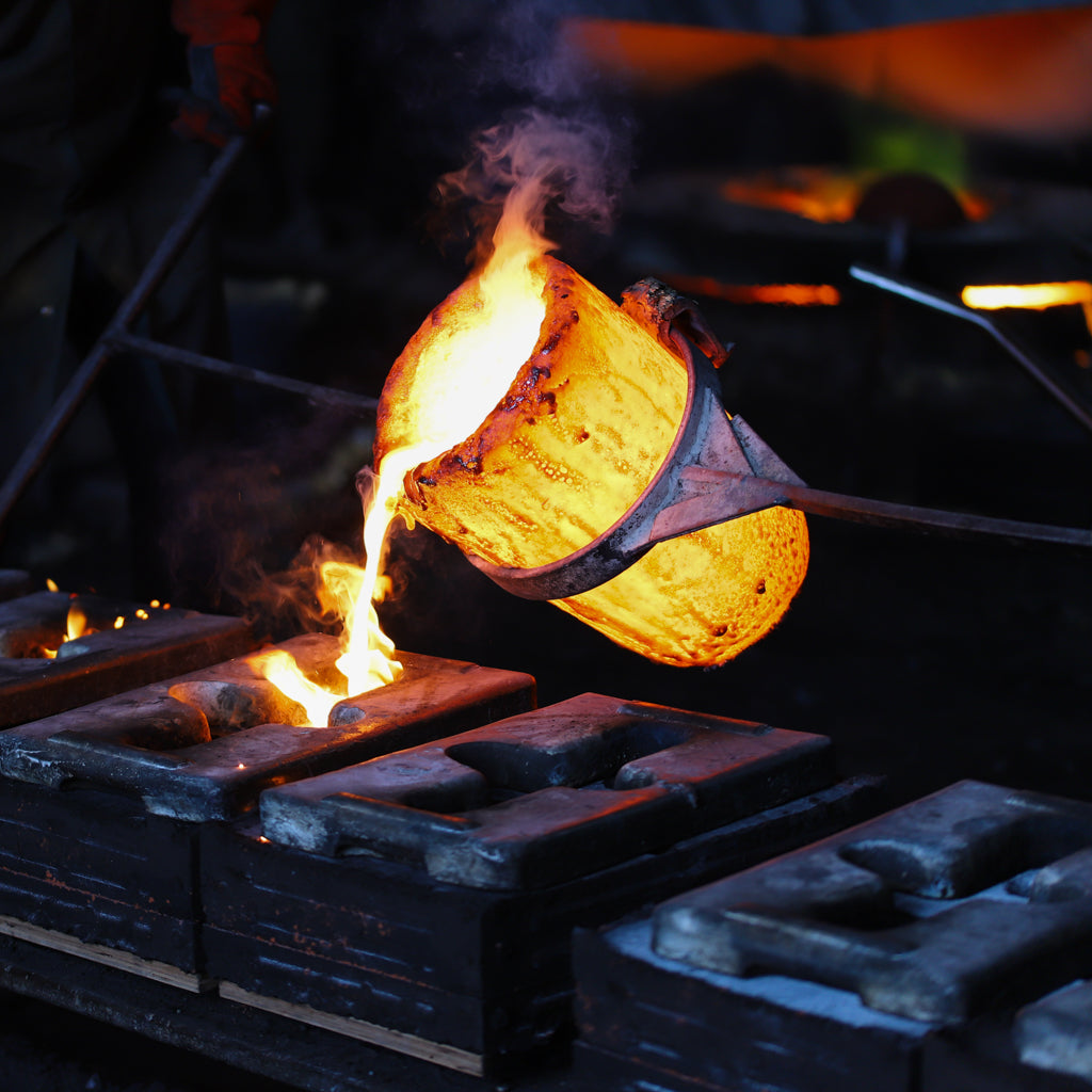 Heavy crucible of molten brass