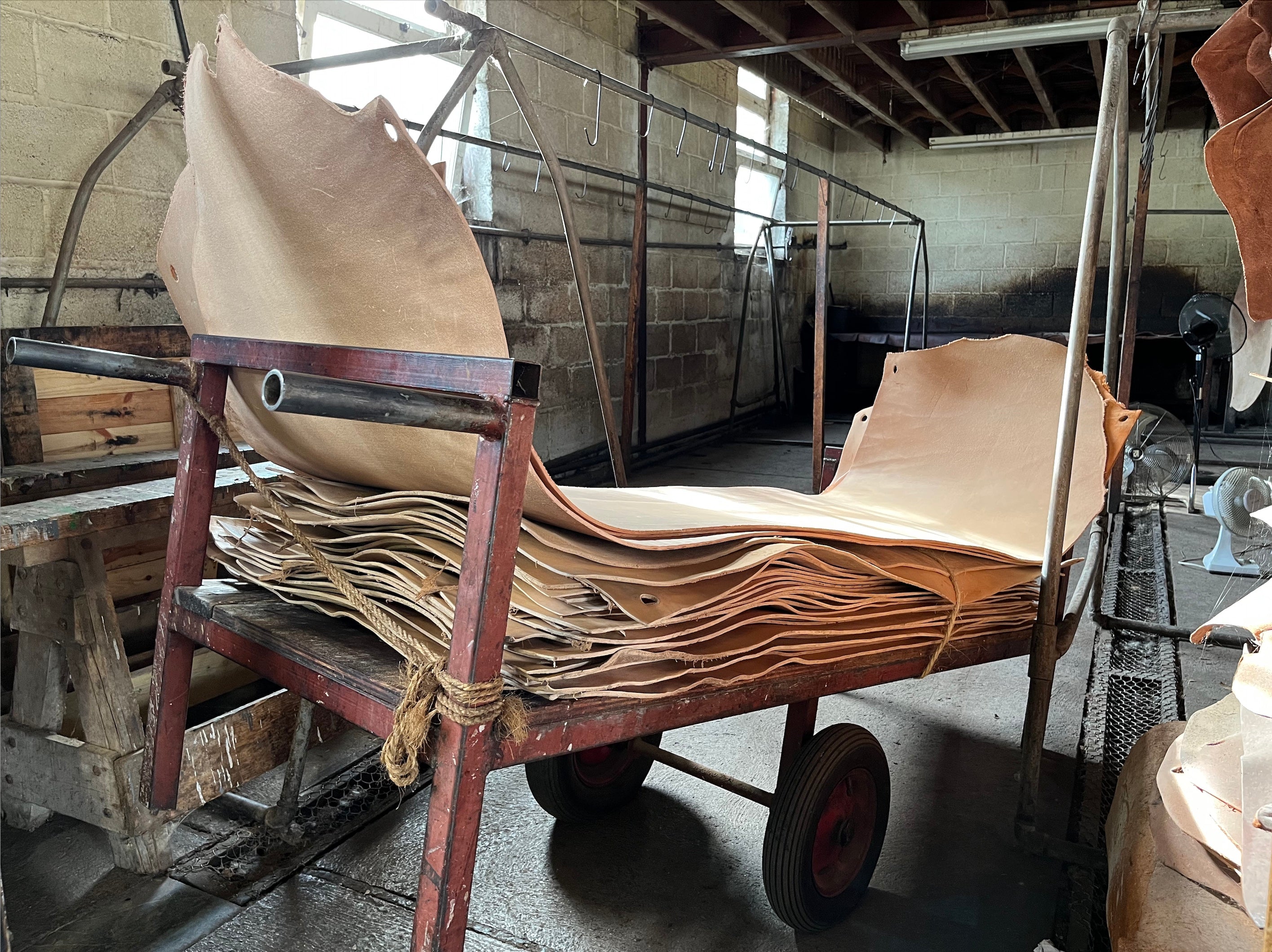 Stacked leather hides at tannery