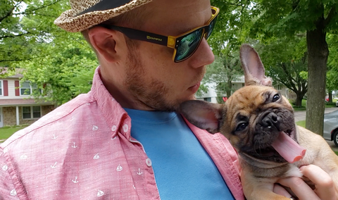 Jonny Lipford holding Duke the French Bulldog