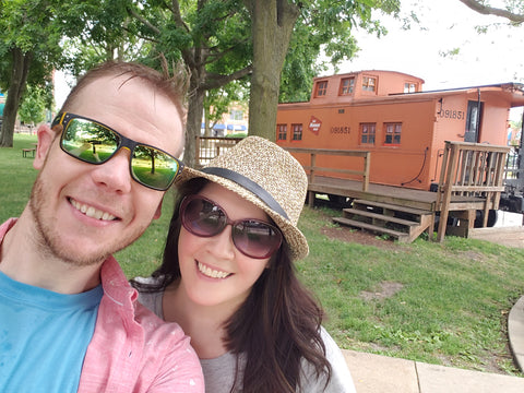 Jonny Lipford and Maria Lipford standing in front of a train in Marion Iowa after filming Jason Mraz I'm Yours