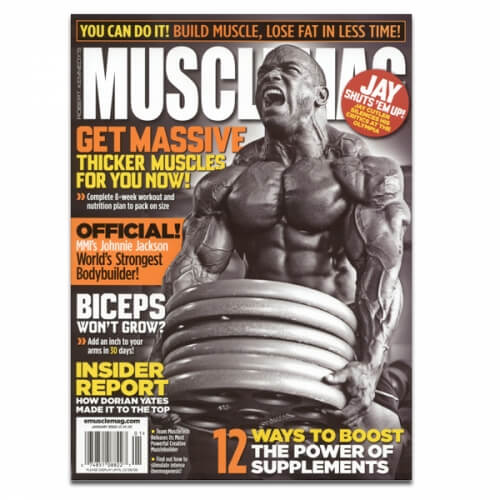 Muscle Mag lifting a stack of Ivanko Weight Plates