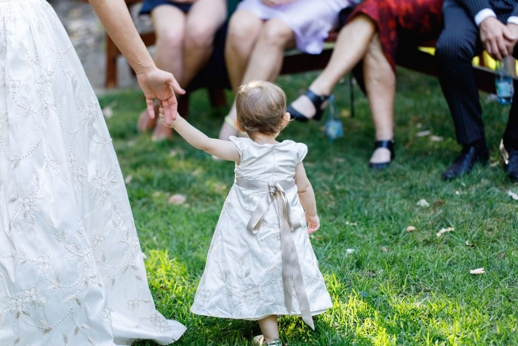 Samantha Wynne Weddings - Isla in her custom french knot silk flowergirl dress