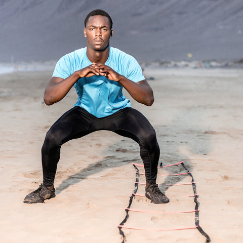 man doing agility ladder work for sports