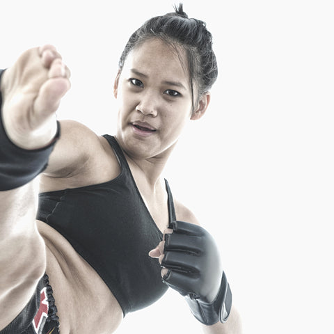 mma kickboxing muay thai lady kicking high front kick