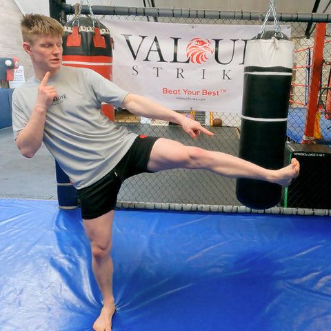 kickboxing kicking with the foot on a front kick
