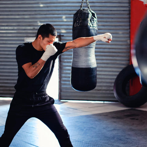 man shadow boxing