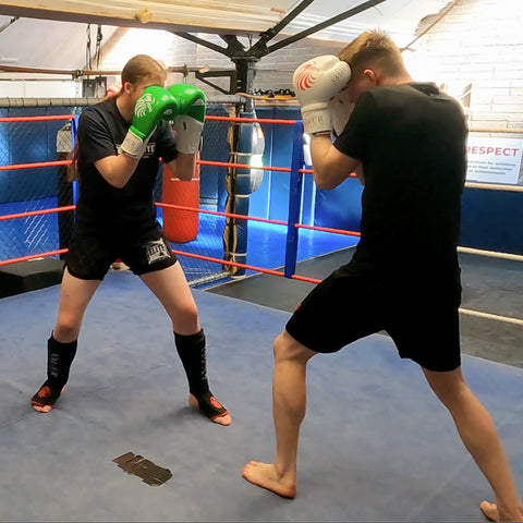 boxing guard up defence in kickboxing guard block guard up sparring in ring in valour strike boxing gloves