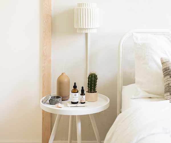 Bedside table with skincare products