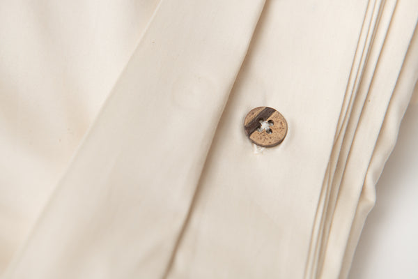 HauteCoton natural duvet with coconut shell button