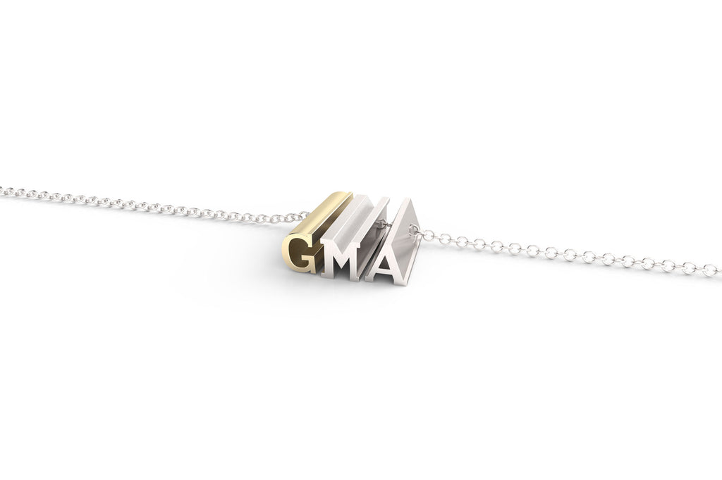 A 'GMA' pendant necklace for grandma in sterling and yellow gold.
