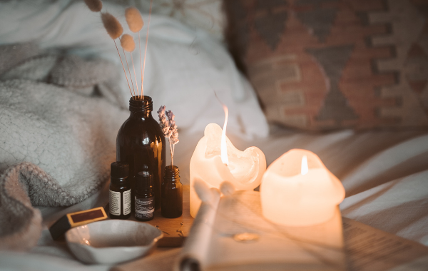 Lighting candles with soothing scents can help insomnia