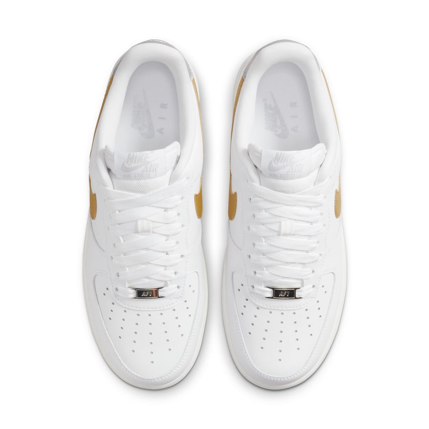 white nike air force with gold