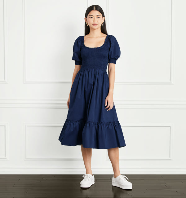 Sophia wears a size XS in the Navy Cotton color:navy cotton