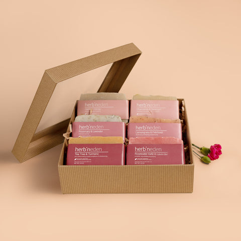 Image of 6 bar soaps packaged with pink bands for Mother's Day