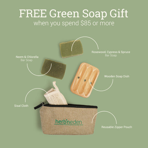 Our Green Soap Gift including 2 bar soaps, sisal cloth, wooden soap dish, and reusable travel pouch all laid out