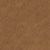 Close-up of textured brown leather surface with natural creases and grain detail.