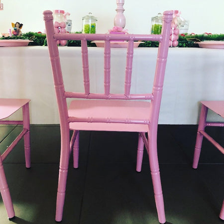 pink and wood chair