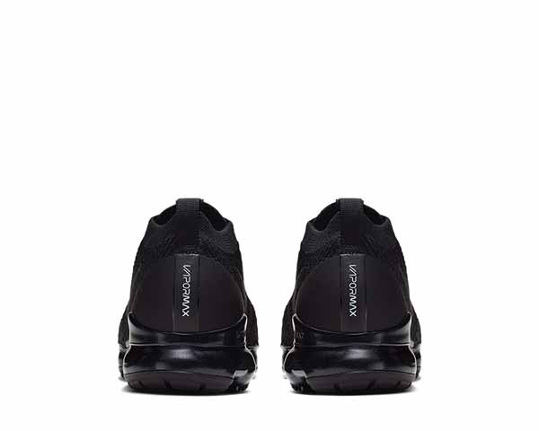 black vapormax with white tick