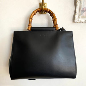 nymphaea leather mini bag