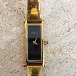 gucci bracelet watch gold