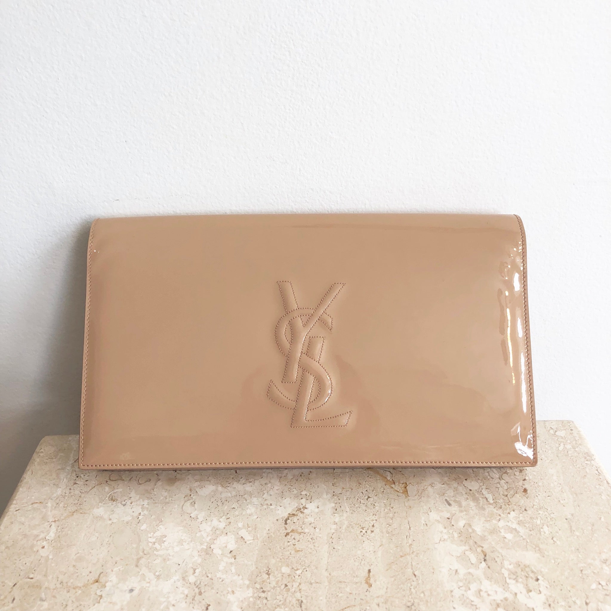 tan patent leather clutch