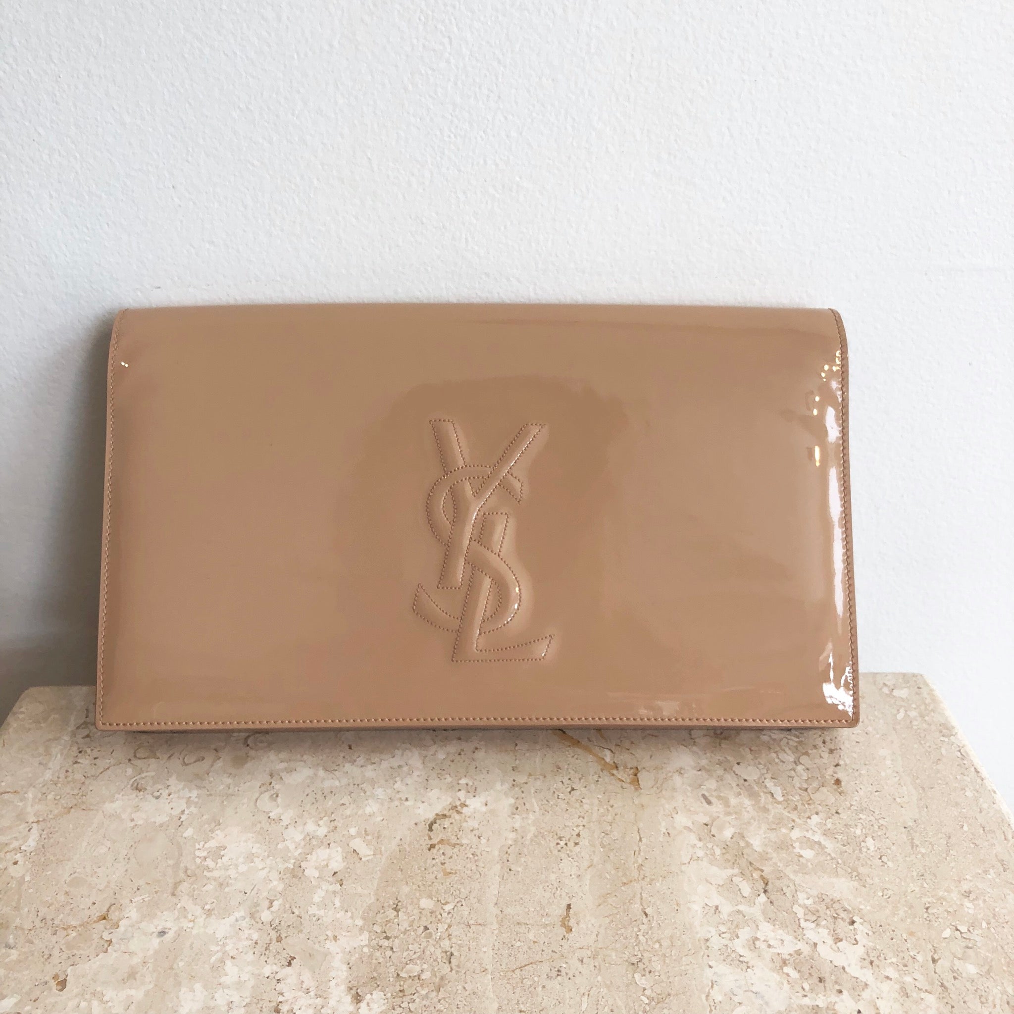 tan patent leather clutch