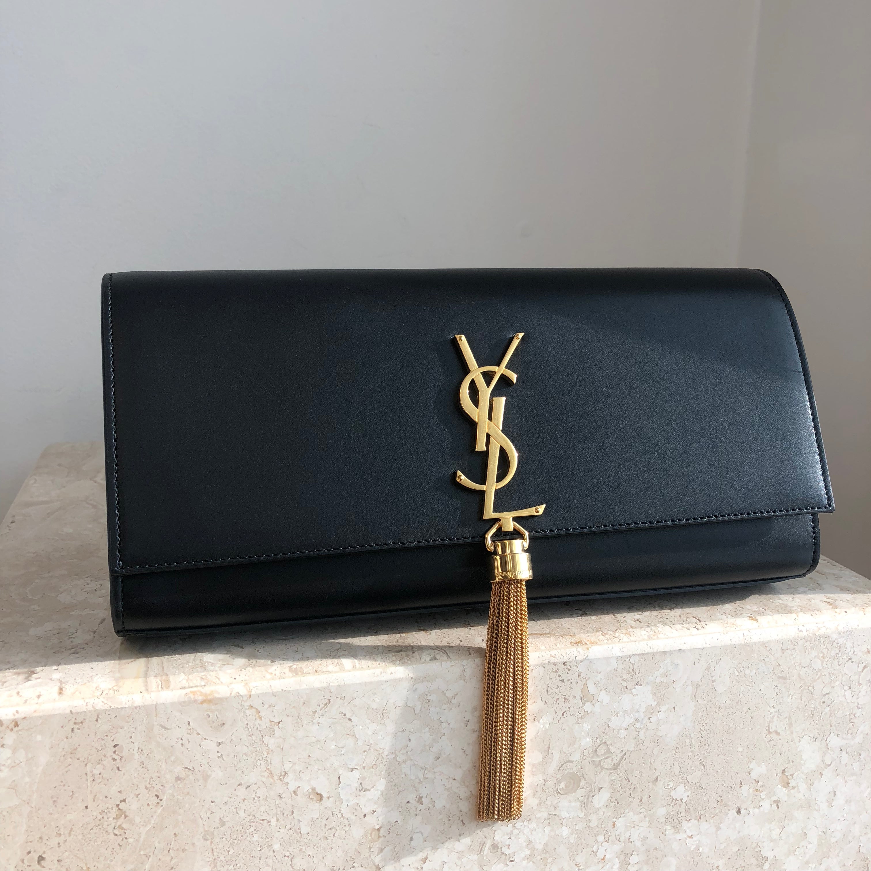 ysl gold tassel clutch