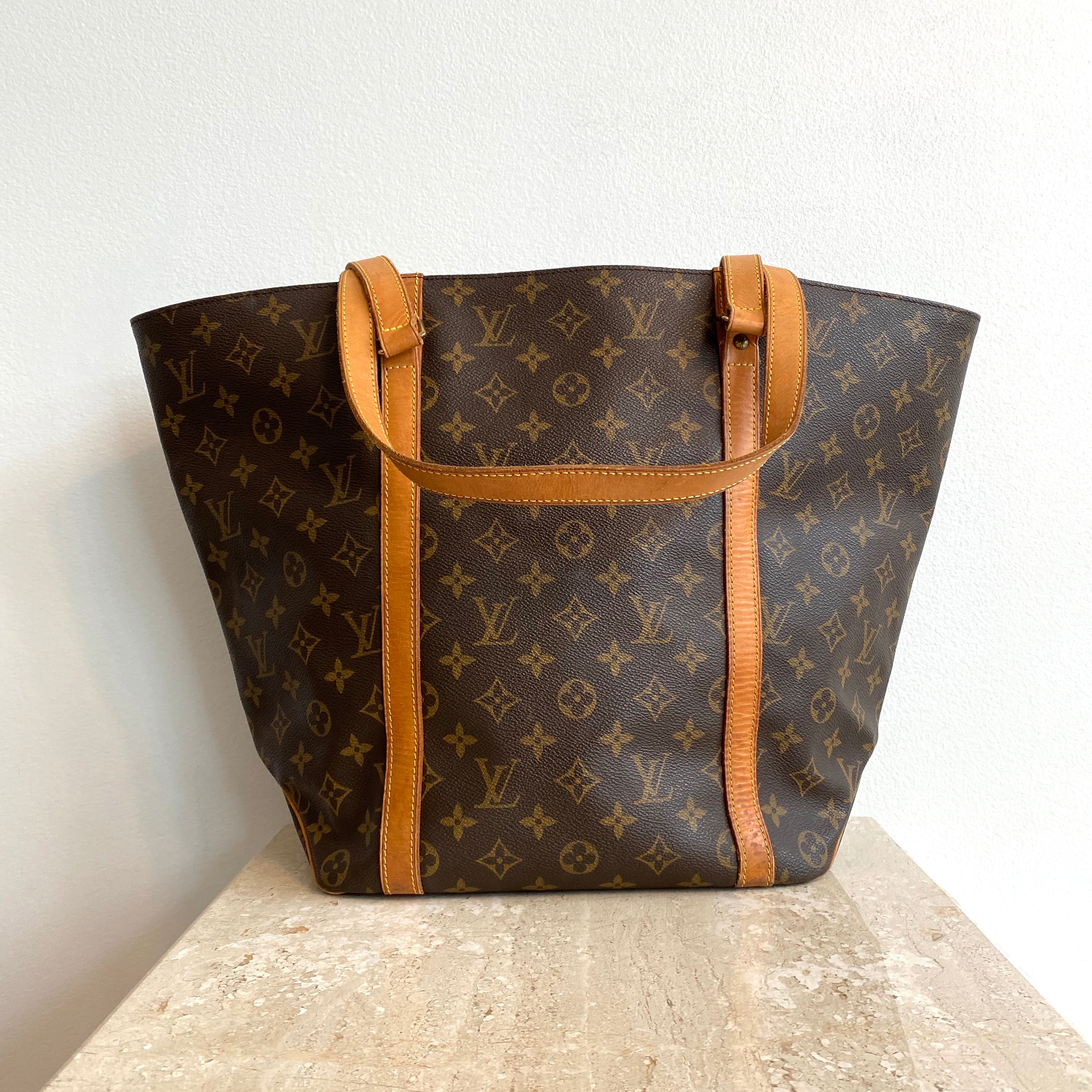 Babylone vintage cloth handbag Louis Vuitton Brown in Cloth - 12152944