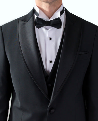 a bow tie is a must to wear with a black tie suit