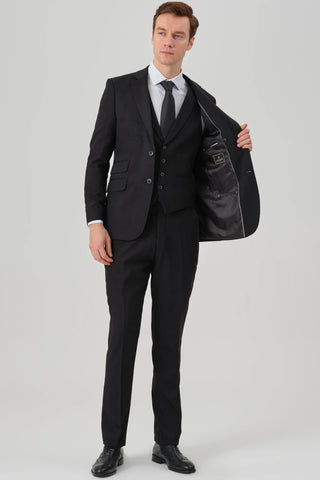 A black three-piece suit is one of the most versatile and formal suits you can wear