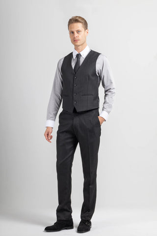 For a more subdued and elegant option, a light grey shirt complements the black suit perfectly.