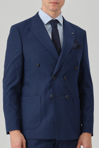 A navy suit is the ultimate classic, and pairing it with a blue formal shirt is a match made in heaven