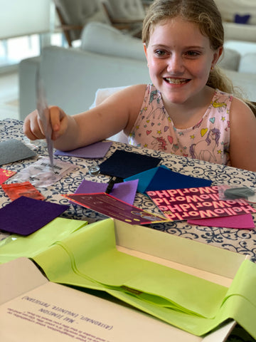 student building her science kit