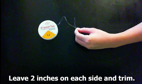 Measure two extra inches and cut the string.
