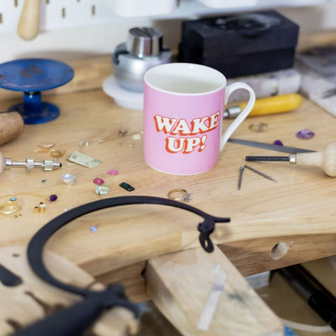 Jewellers bench with saw and cup