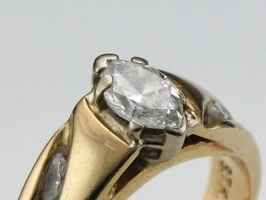 One more example of worn tips on a diamond ring.