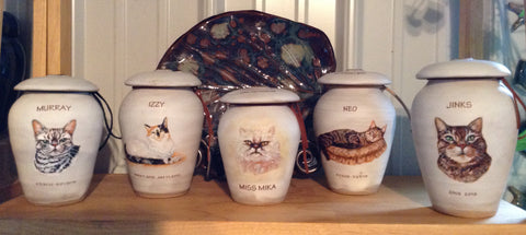 Artisan urns hand painted with your pets likeness