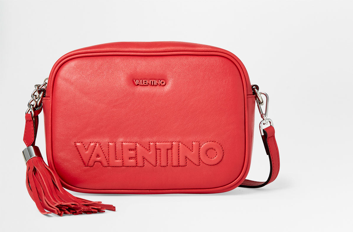 red lipstick in valentino bag