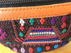 Hand woven and leather fanny pack. Beautiful, hand embroidered fabric combined with leather make this the perfect hands free carry all.
