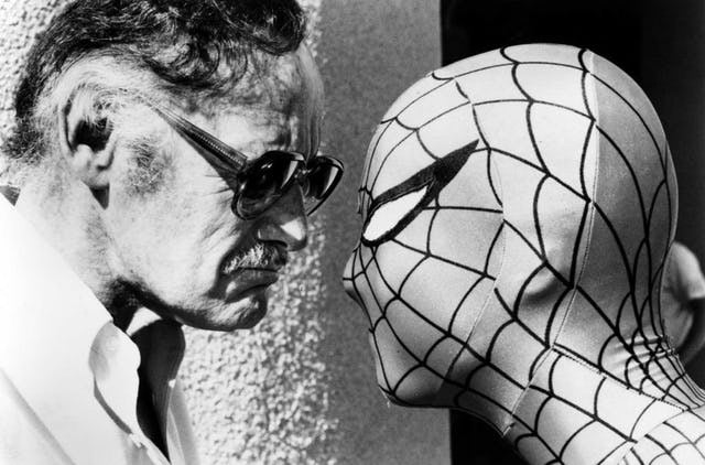 Stan Lee and Spider-Man (Chris Sanders) stare each other down