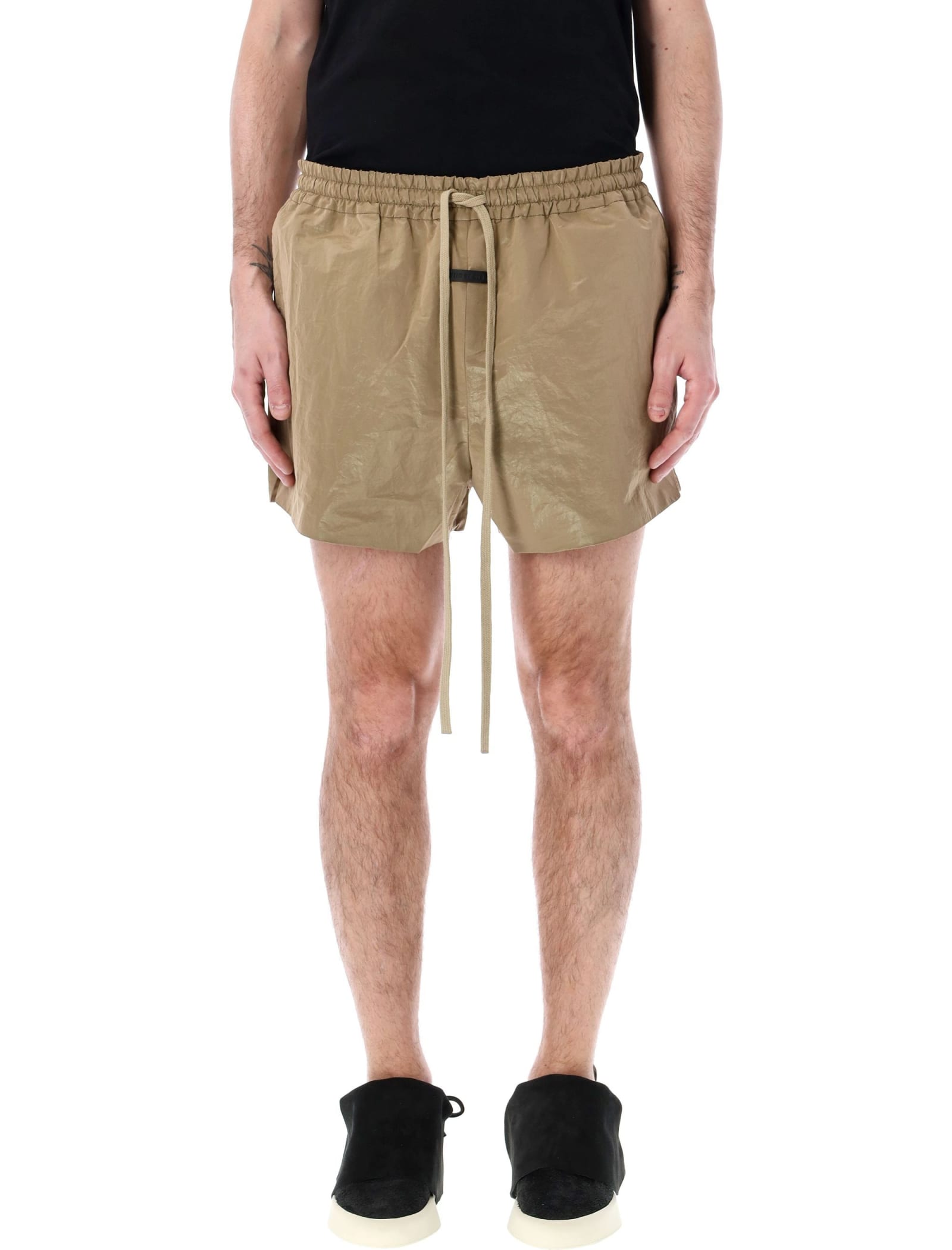 Shop Fear Of God Crinkle Nylon Running Short In Dune