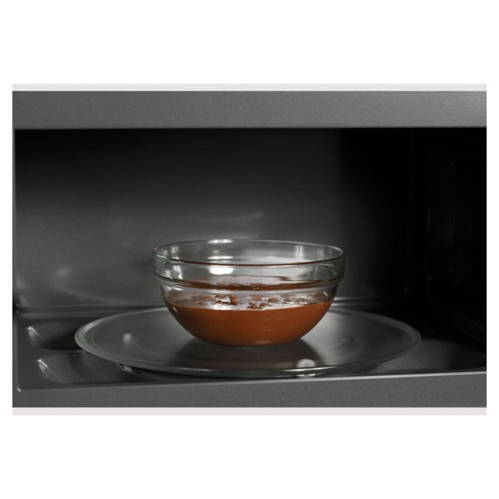 GE-PVM9215SKSS-melted chocolate inside a microwave oven