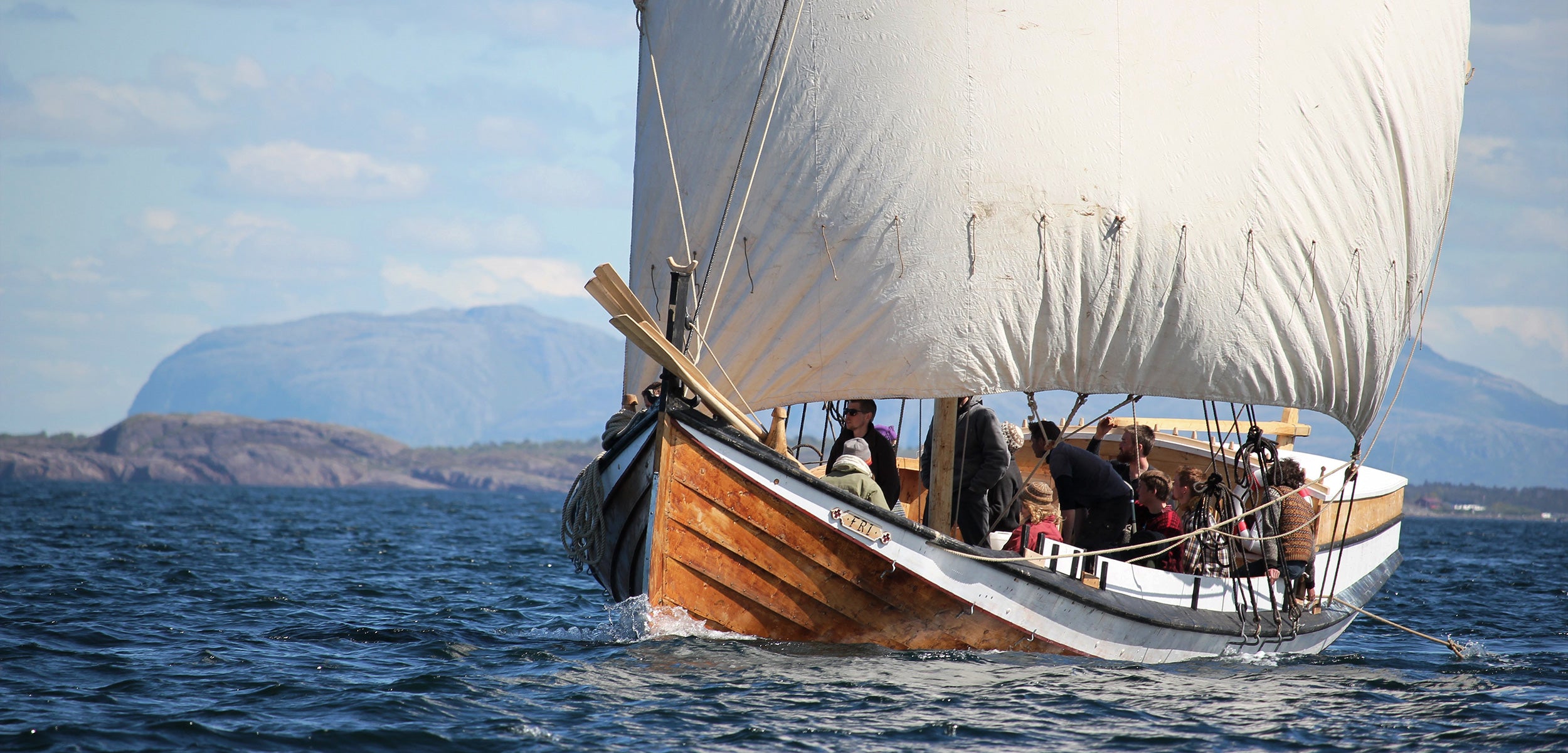 A modern viking ship cruising on water