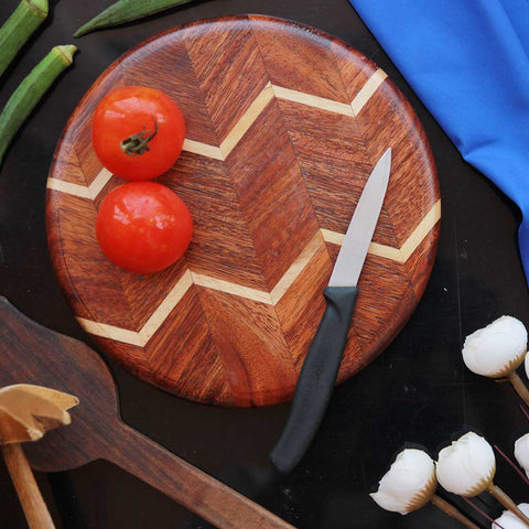 Chevron Pattern Round Wooden Chopping Board. This Round Cutting Board Makes One Of The Best Anniversary Gift Ideas. Shop More Personalized Gifts For Him And Her On Your 5th Wedding Anniversary.