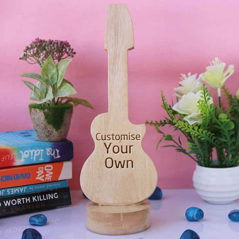 Wooden Guitar Shaped Award & Trophy. Customise Your Own Wooden Trophies & Awards. Create Your Own Custom Trophies. Personalised Music Awards for the Best Musician or Music Fan. Make Your Own Music Awards, Best Employee Award or Other Employee Appreciation Awards, Funny Awards and Trophies