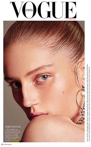 Haus of Topper feather earring in Vogue Mexico 