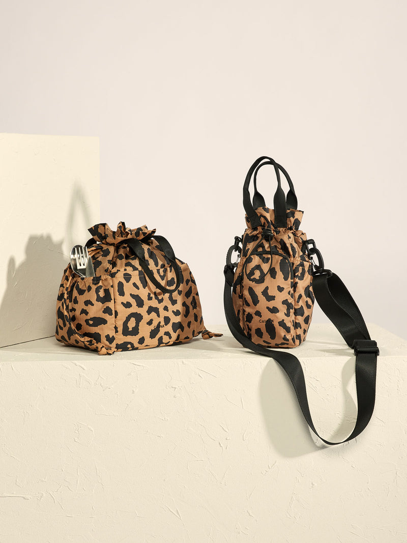 water bottle carrier with crossbody strap in cheetah; AWH2101-CHEETAH