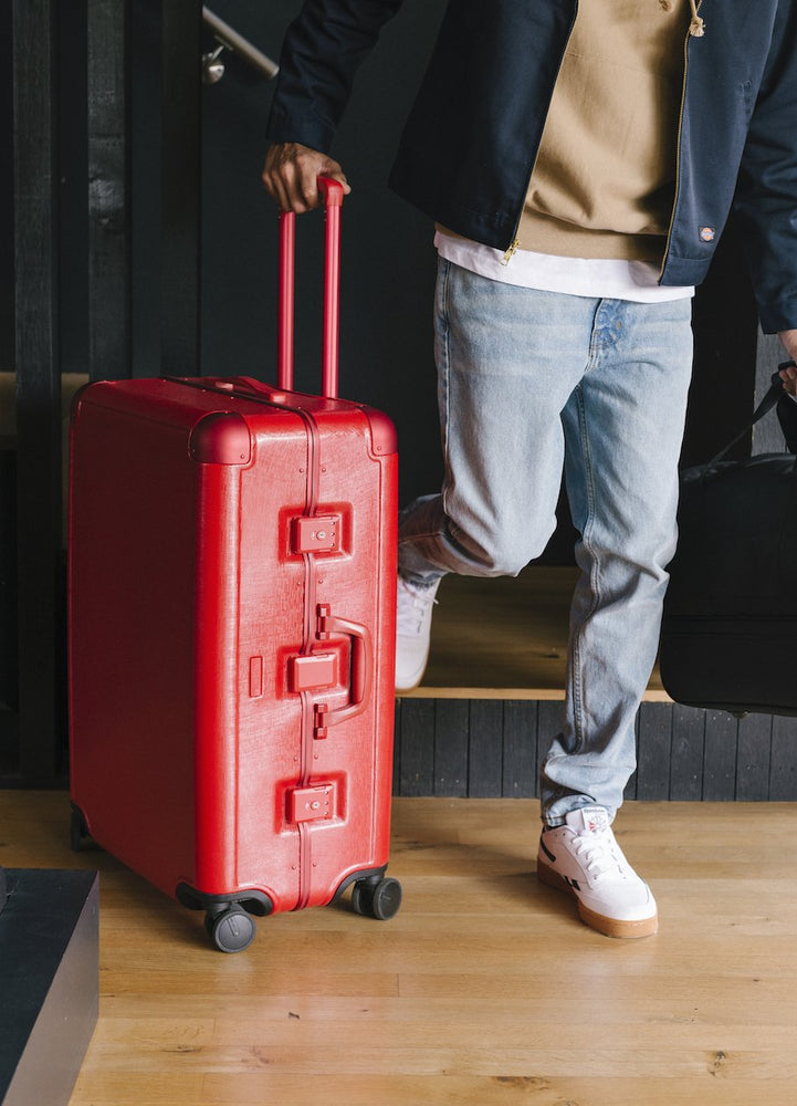 calpak red luggage